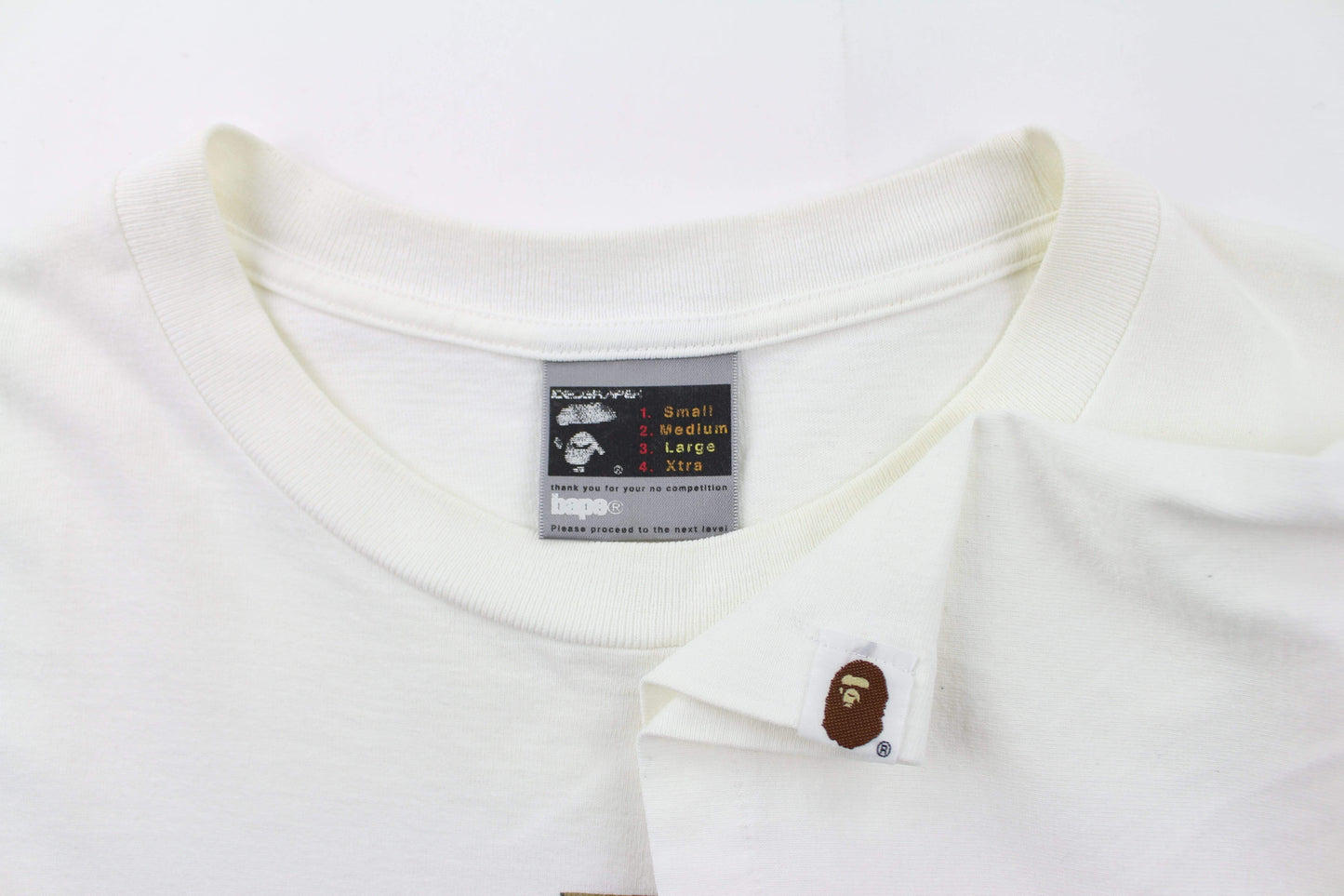 Bape tribal Angry Face College Logo Tee White - SaruGeneral
