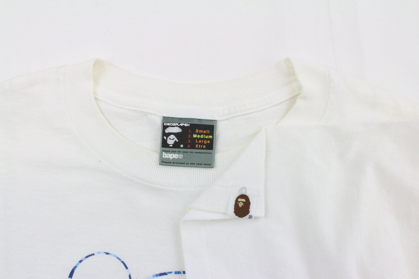 Bape x Kaws Michelin Man Tee White - SaruGeneral