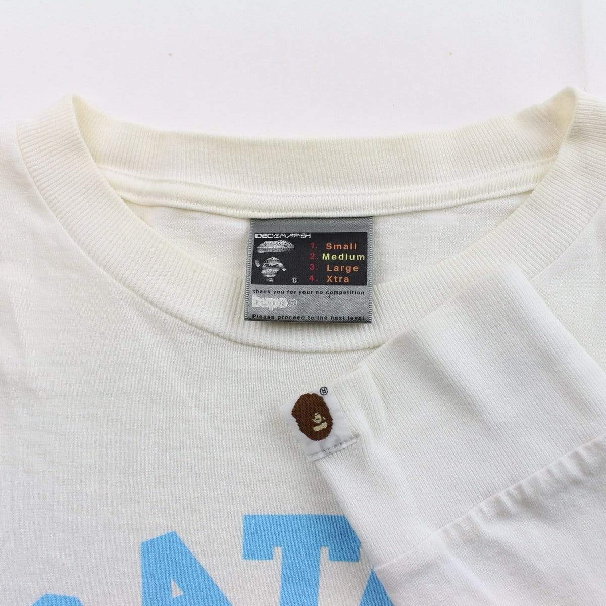 bape blue angry face college logo ls white - SaruGeneral