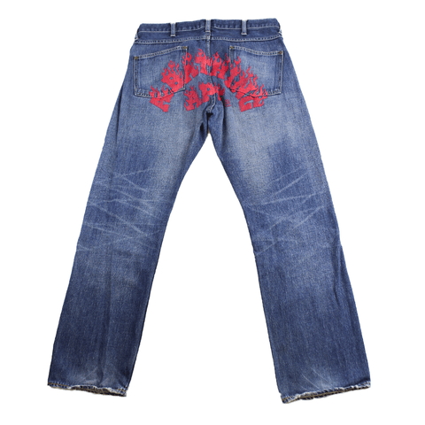 Jean Bape en denim rouge flamme