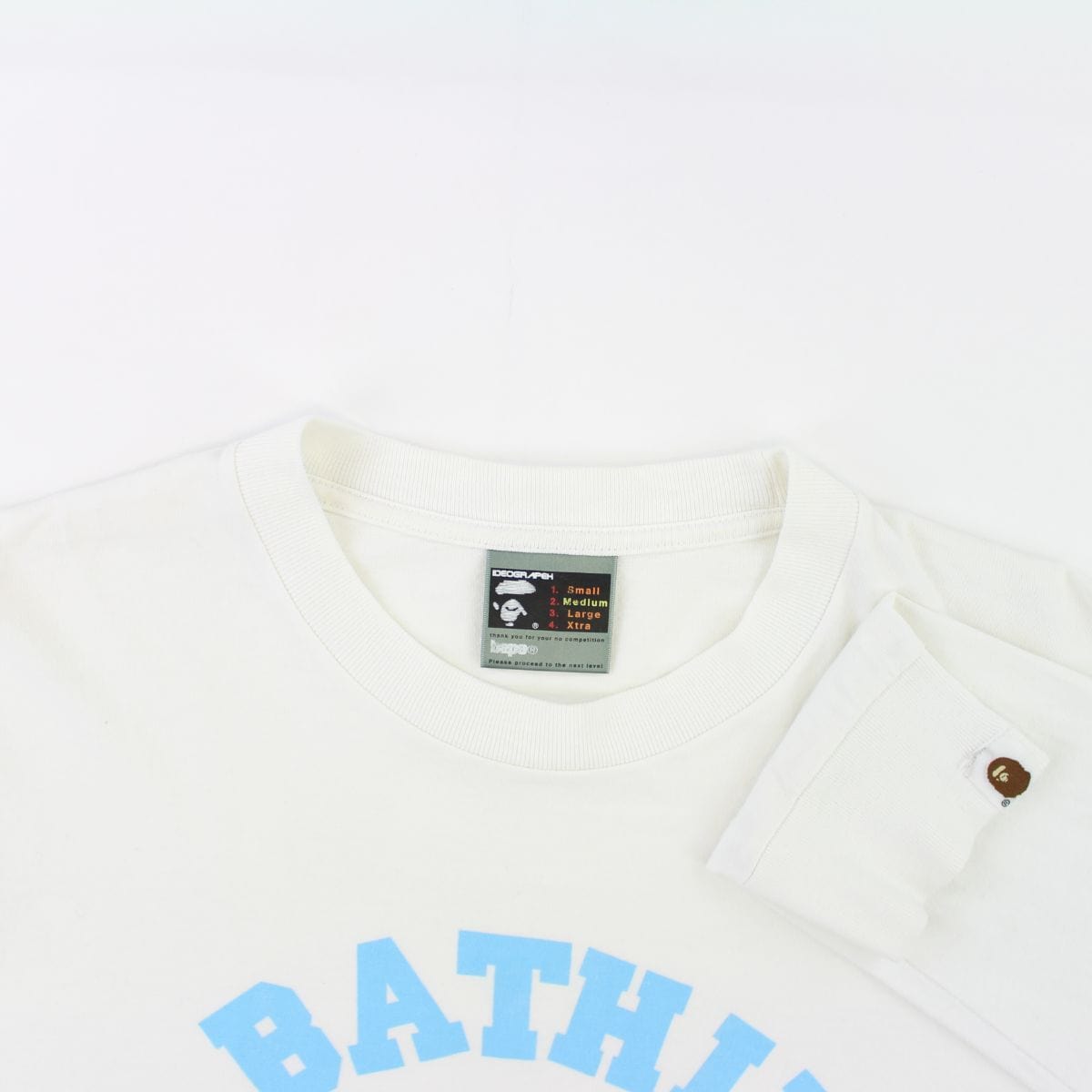 Bape Baby Blue Angry Face College Logo LS White - SaruGeneral