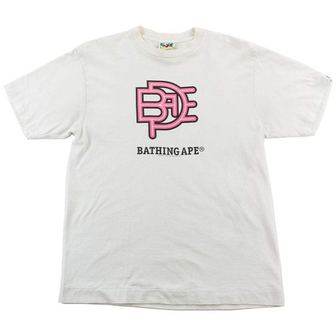 T-shirt Bape rose avec symbole de texte blanc