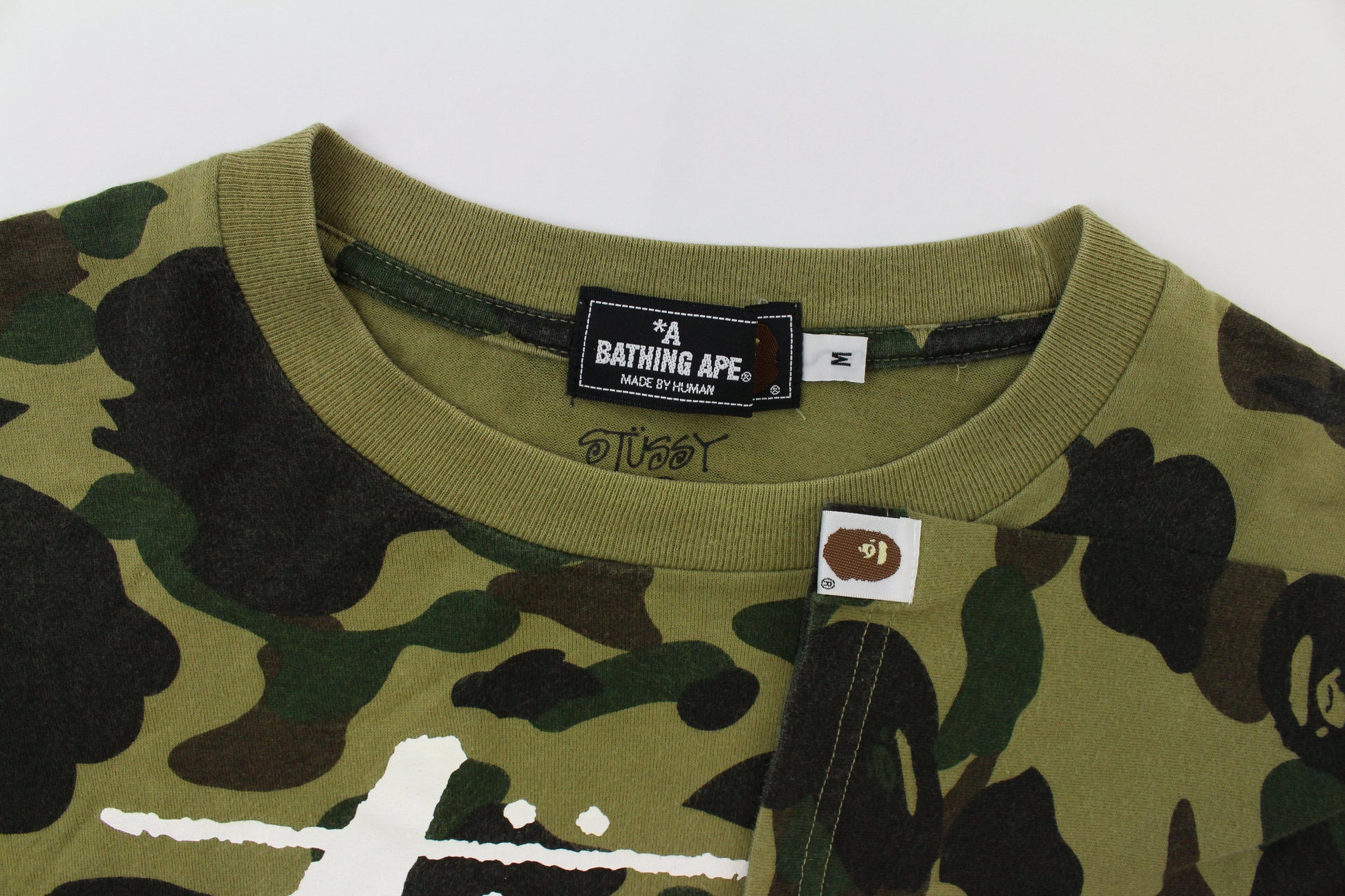 Bape x Stussy White Logo Tee 1st Green Camo - SaruGeneral