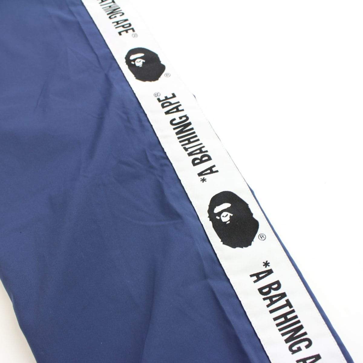 bape side strip track pants navy - SaruGeneral