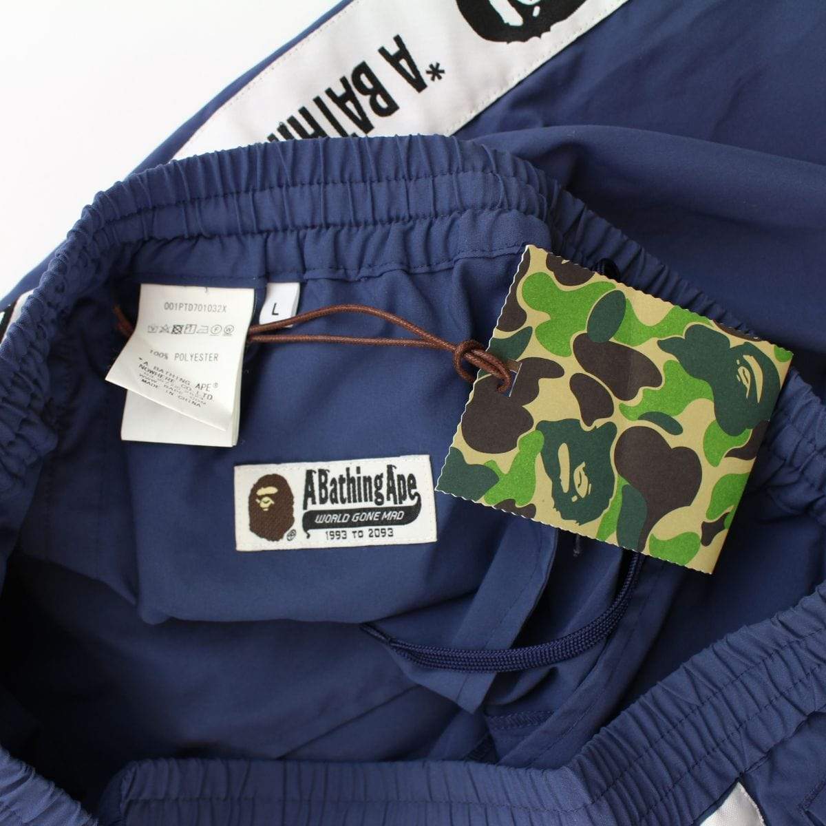 bape side strip track pants navy - SaruGeneral