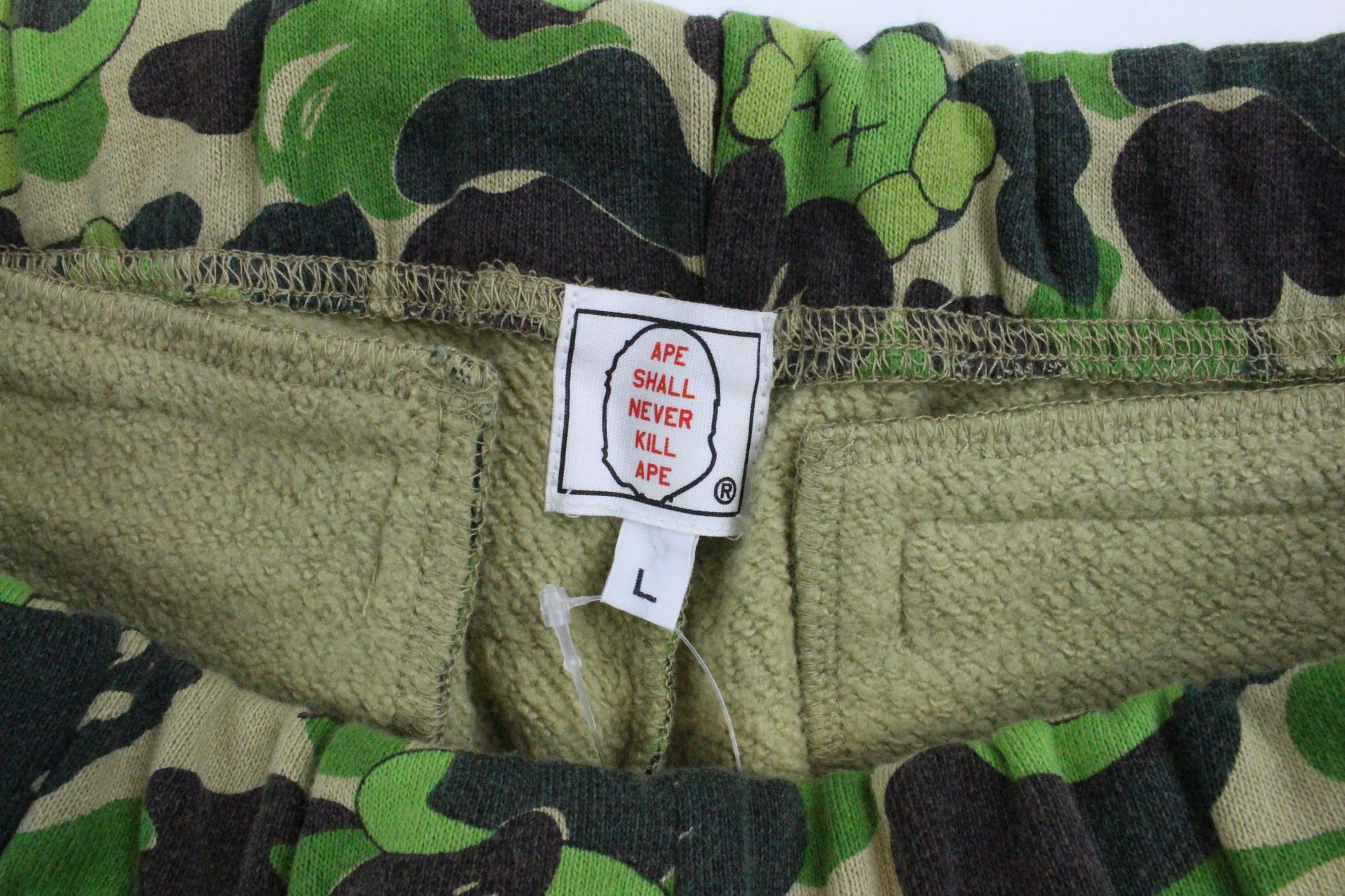 Bape x Kaws ABC Green Camo Shorts - SaruGeneral