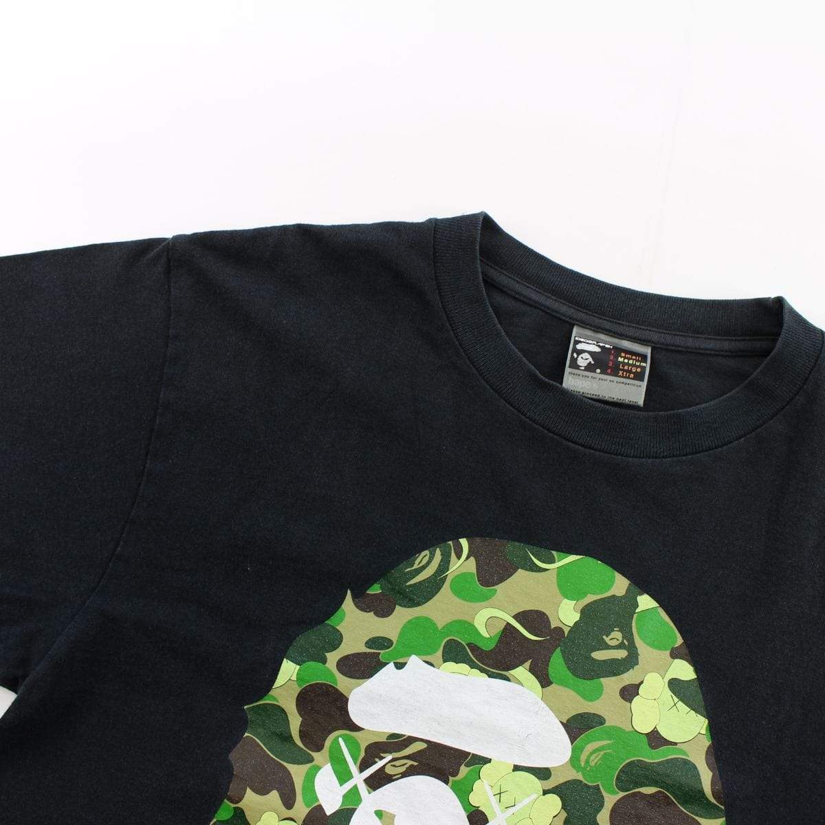 Bape x Kaws ABC Green Camo Big Ape Logo Tee Black – SARUGENERAL
