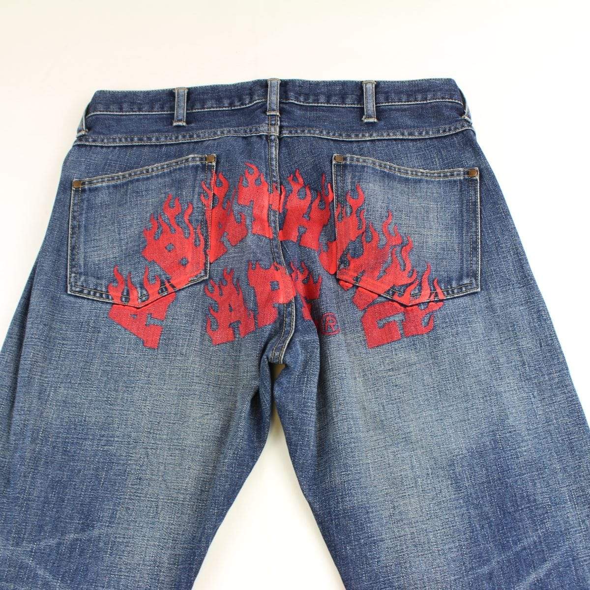 Bape Red Flame Text Jeans - SaruGeneral