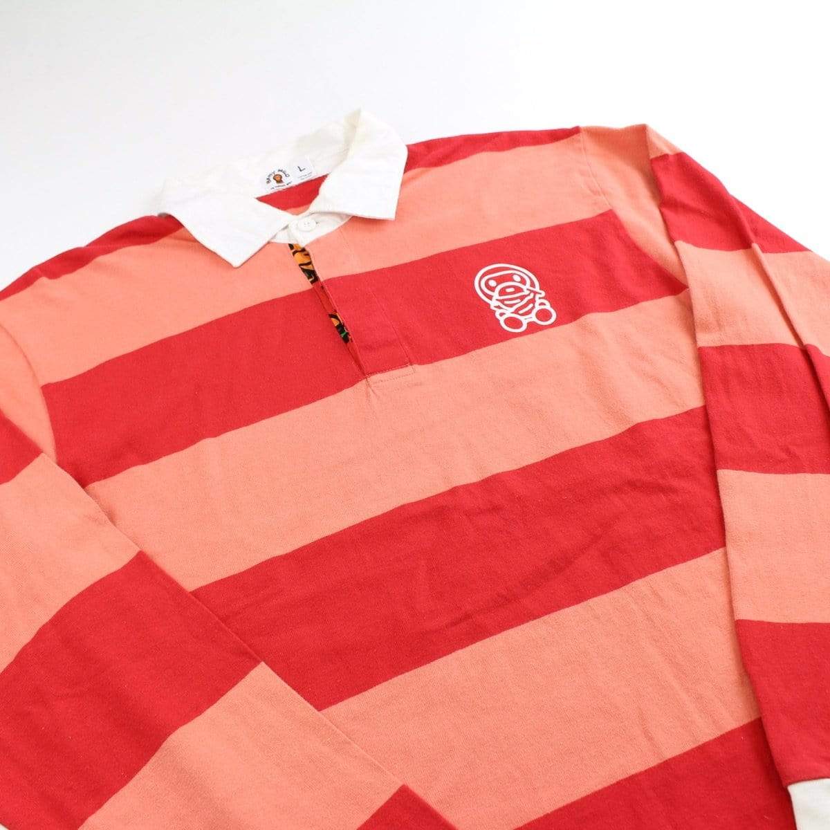 Bape baby milo peach stripe rugby shirt - SaruGeneral