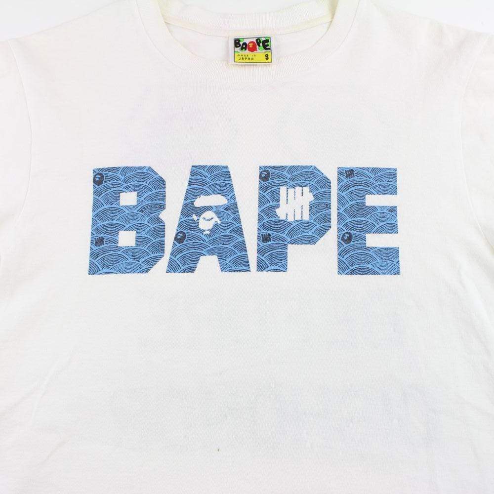 Bape x Undefeated Text Logo Tee White - SaruGeneral