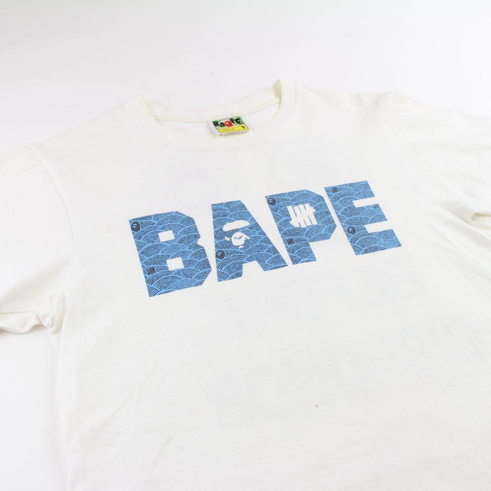 Bape x Undefeated Text Logo Tee White - SaruGeneral