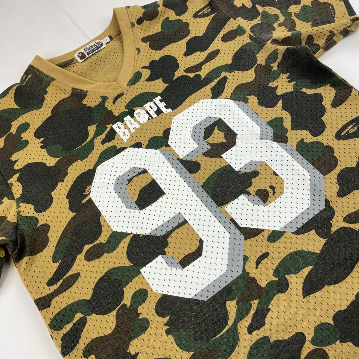 Bape 1st Yellow camo mesh jersey - SaruGeneral